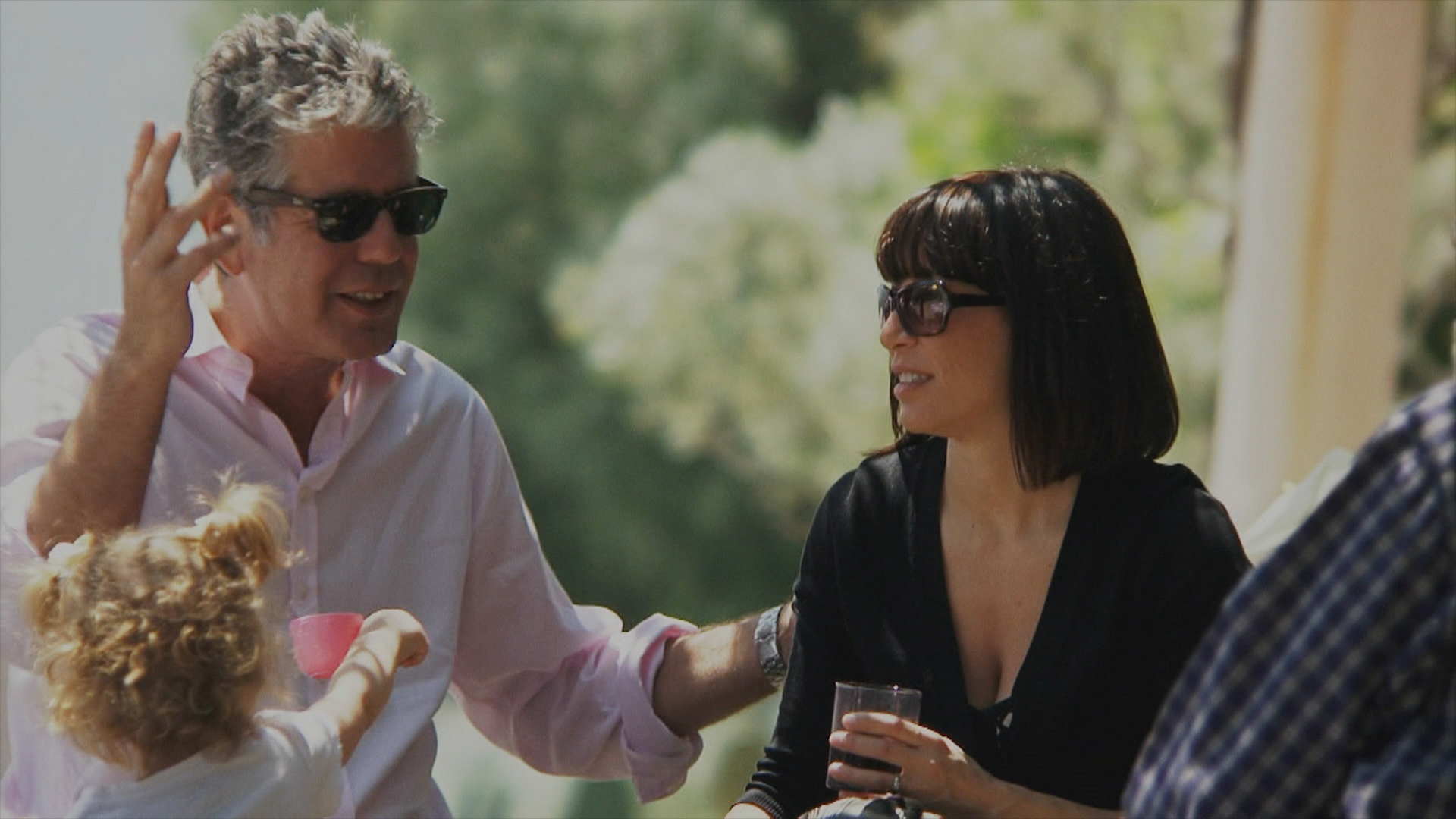 Bourdain, his second wife Ottavia Busia-Bourdain, and their daughter Ariane