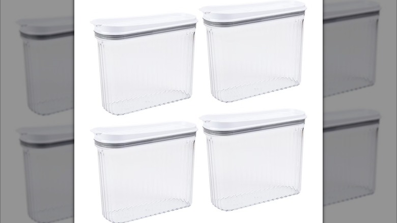 Four of the SharpChef Airtight Cereal Dispenser Food Storage Container from Target on a white background.