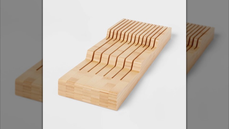 The Brightroom Natural In-Drawer Knife Organizer from Target on a grey background.