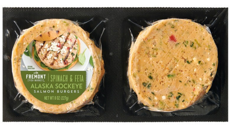 Fremont Fish Market Spinach Feta Salmon Burgers in their package on a white background.