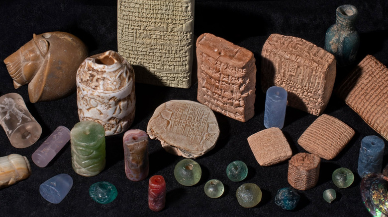 A picture of items in the Yale Babylonian Collection on a black surface