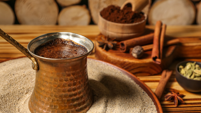 Turkish coffee brewed on hot sand