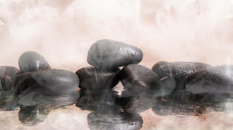 Stones in steamy water