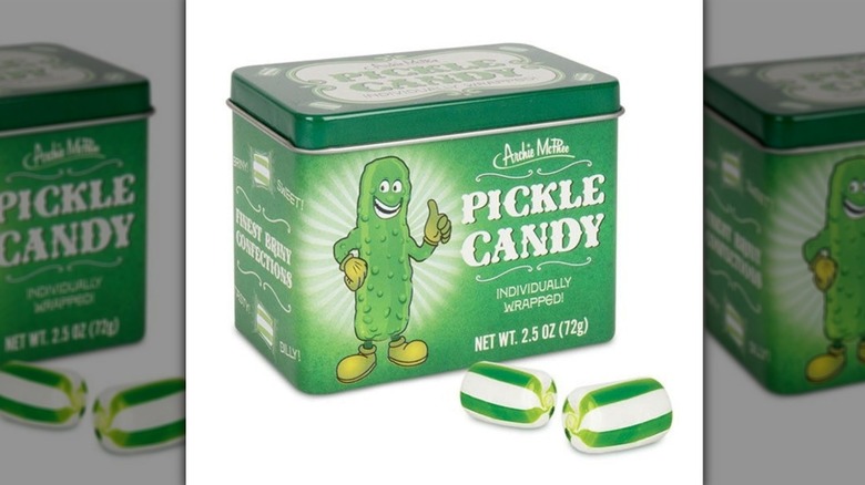 Pickle candies in a decorative tin from Archie McPhee on a white background.