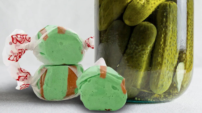 Close-up of Taffy Town Saltwater Taffy in front of a jar of pickles