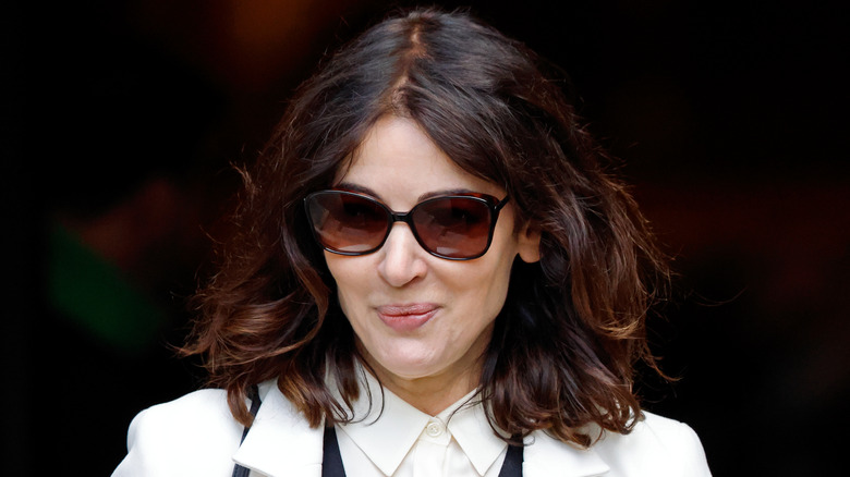 Nigella Lawson wearing sunglasses and smiling