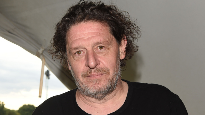Marco Pierre White staring into camera