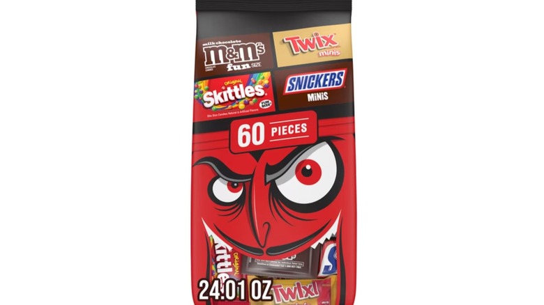 Product image of M&M's, Snickers, Skittles & Twix Halloween Candy Variety Pack on a white background.