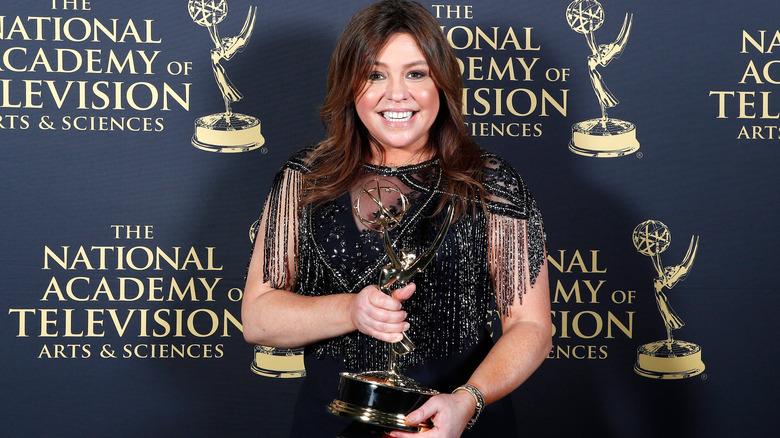 Rachael Ray holding her Emmy