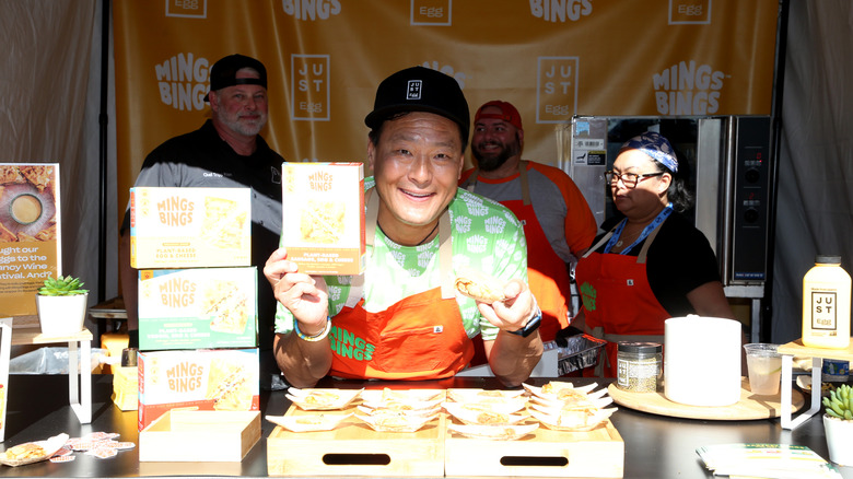 Ming Tsai in a booth at the New York Food Show