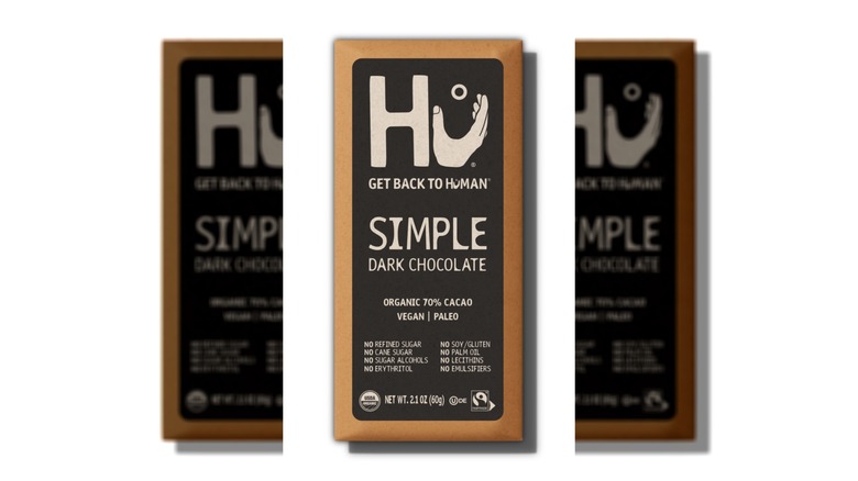 A Hu simple dark chocolate bar in the wrapper