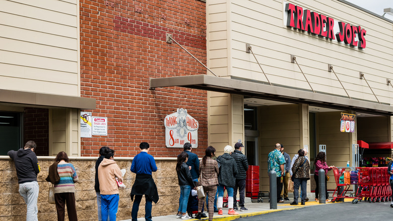 Trader Joe's shoppers standing in line outside the store