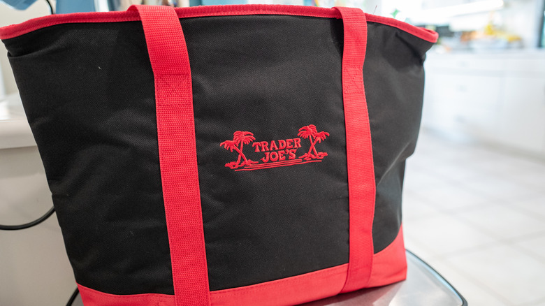 Large Trader Joe's tote bag filled with items