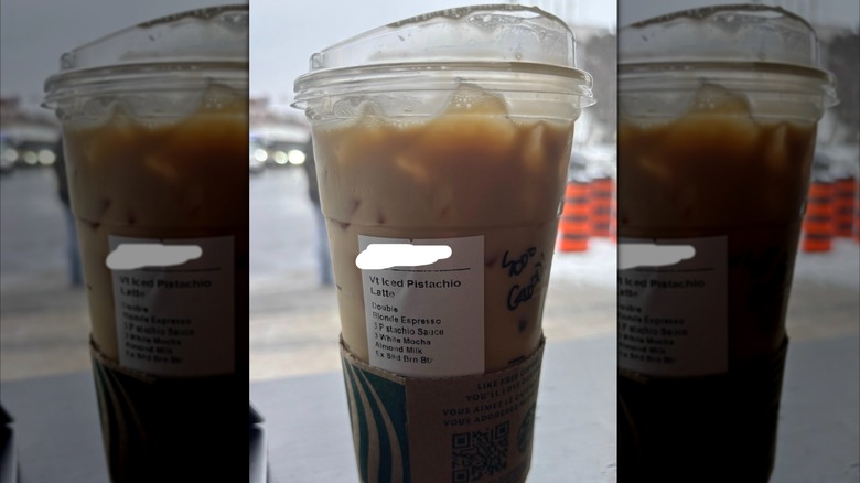 An iced Starbucks drink labelled as an Iced Pistachio Latte
