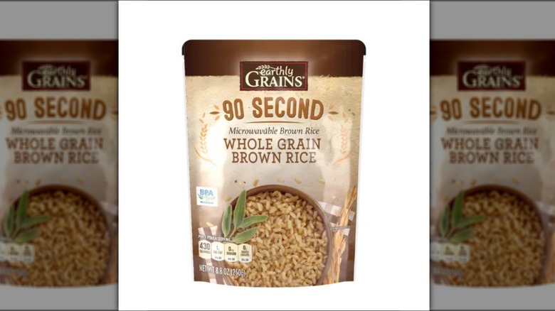 Earthly Grains 90-second brown rice in packaging isolated on a white background