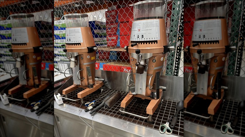 Industrial coffee grinders at Costco in 2023.