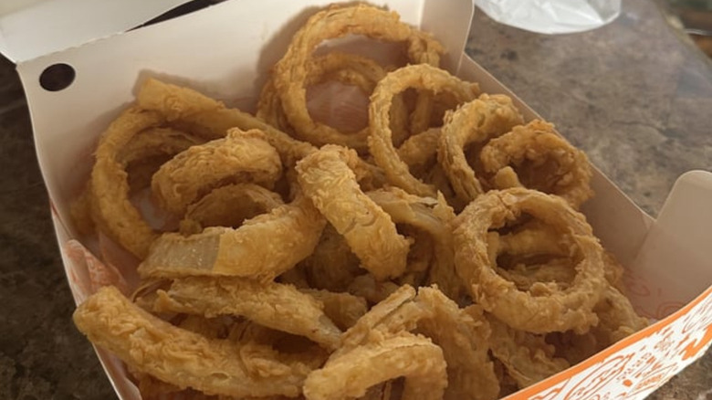 A box of Popeyes Onion Rings