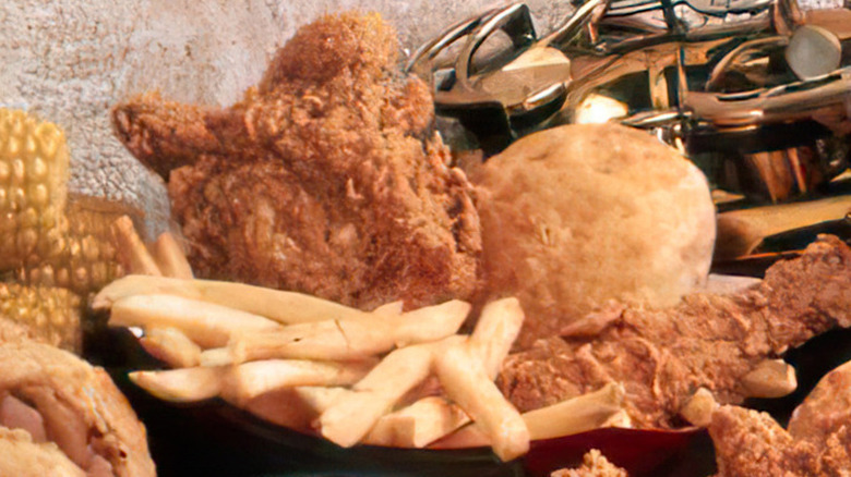 Unbattered fries next to Popeyes fried chicken