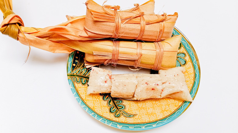 Wrapped and unwrapped lepet sticky rice