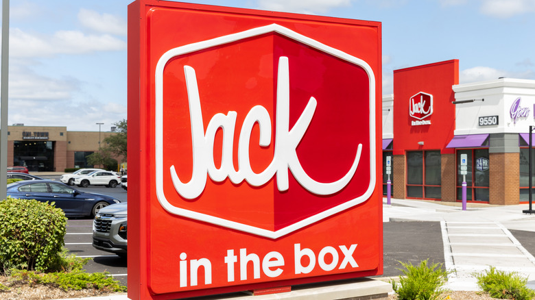 A Jack in the Box sign in front of one of the restaurants.