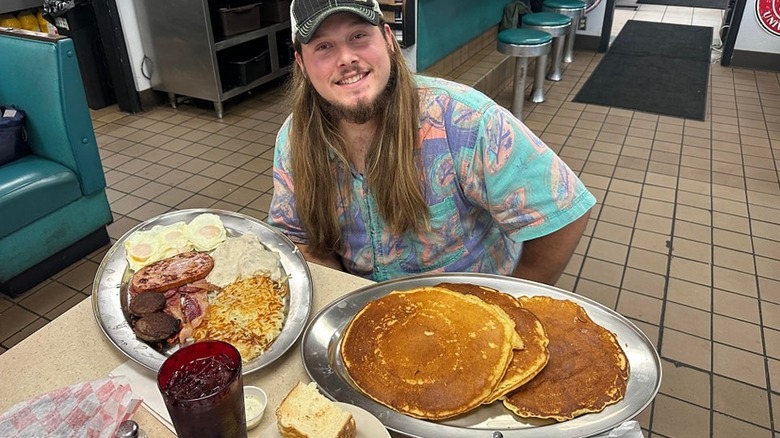 Arlene's customer with oversized breakfast