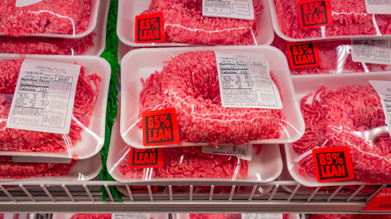 Packages of ground meat on display at a grocery store
