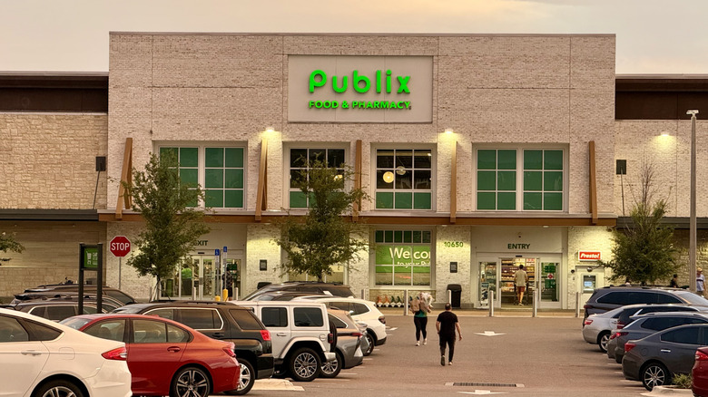 Customers walk into a Publix store