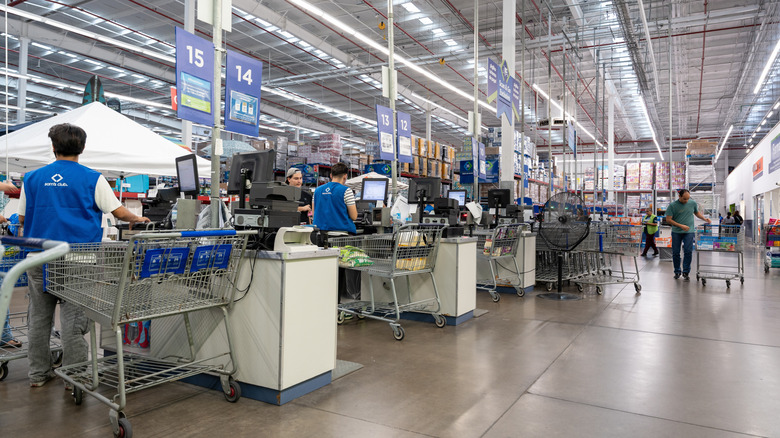 Checkouts at Sam's Club with customers