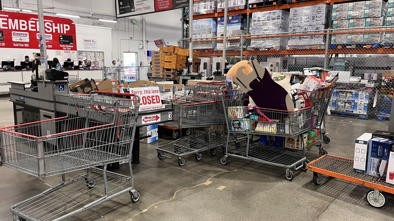 Returns wait to be put back on the shelves at a Costco store