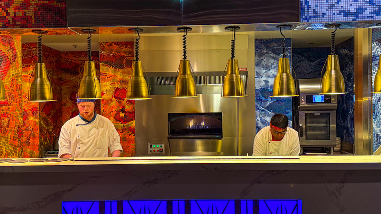 Two chefs working in Hell's Kitchen