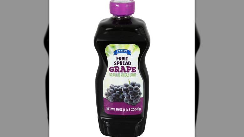 A bottle of Pampa Grape Flavored Fruit Spread on a white background.