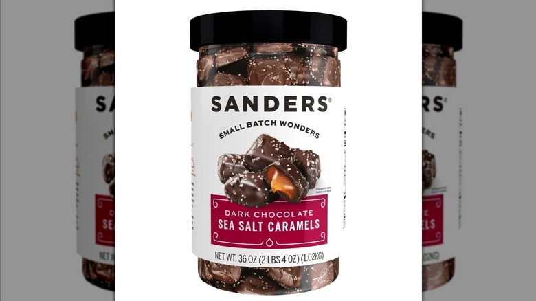 Jar of Sanders Dark Chocolate Sea Salt Caramels on white background