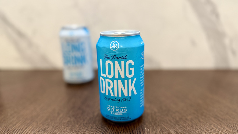 Traditional Citrus Long Drink in front of a zero sugar version of the flavor