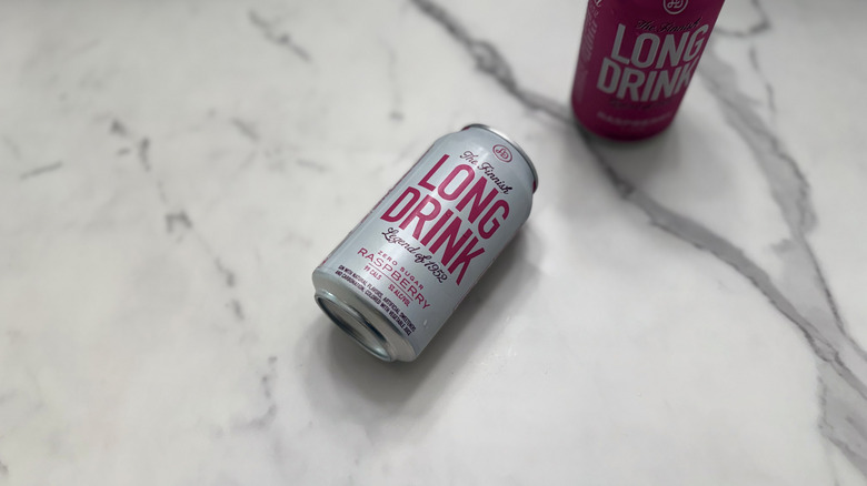 Zero sugar raspberry Long Drink in front of a full sugar version of the flavor