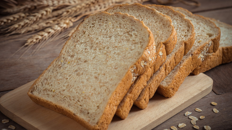 slices of whole wheat bread on a cutting board