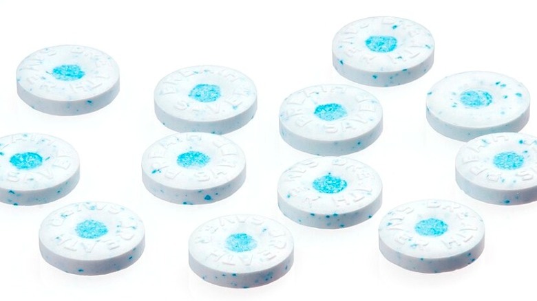 A number of peppermint Breath Savers.