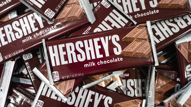 A pile of Hershey's Milk Chocolate bars.