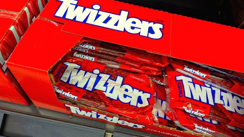A box of Twizzlers on a store shelf.