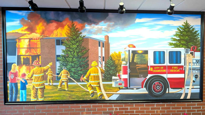 A mural depicting Cranston, Rhode Island, firefighters battling a March 1992 apartment fire located in Firehouse Subs