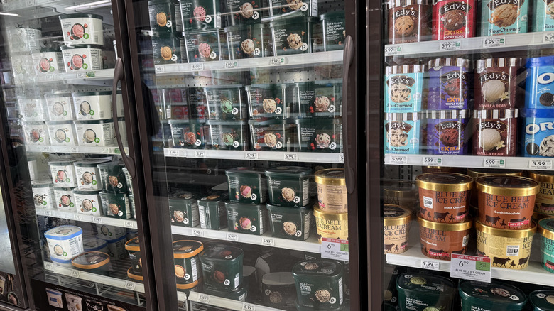 Various Publix ice cream flavors in freezer with other brands at store