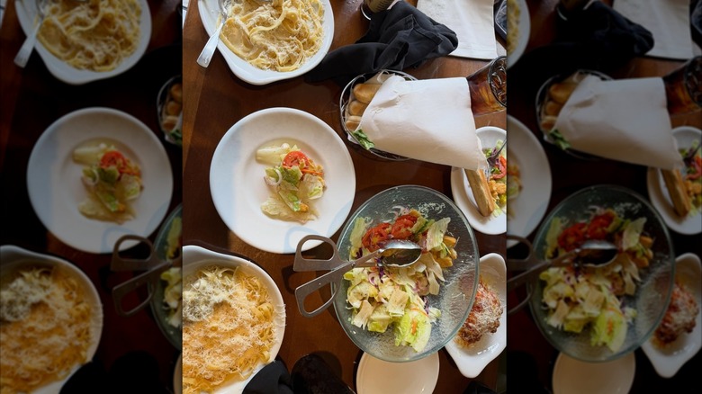 Creamy pasta, salad, and breadsticks from Olive Garden