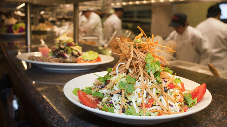 A stacked salad waiting to be served at The Cheesecake Factory