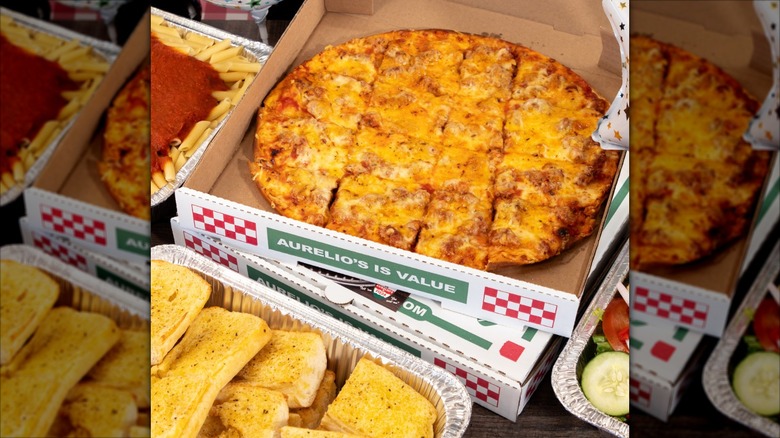 Pizza in Aurelio's box with garlic bread