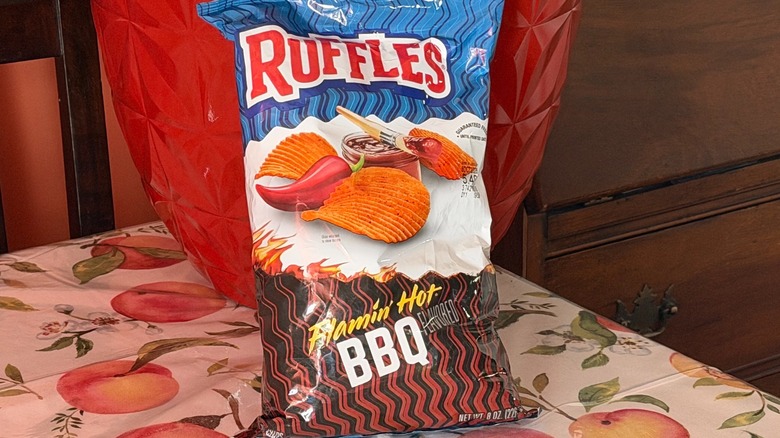 A bag of Ruffles Flamin' Hot BBQ potato chips