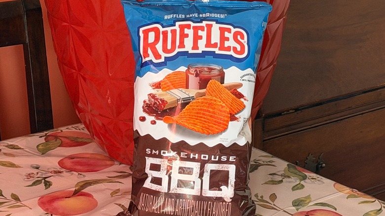 A bag of Ruffles Smokehouse BBQ potato chips