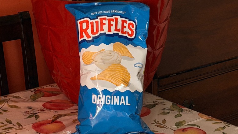 A bag of Ruffles original potato chips