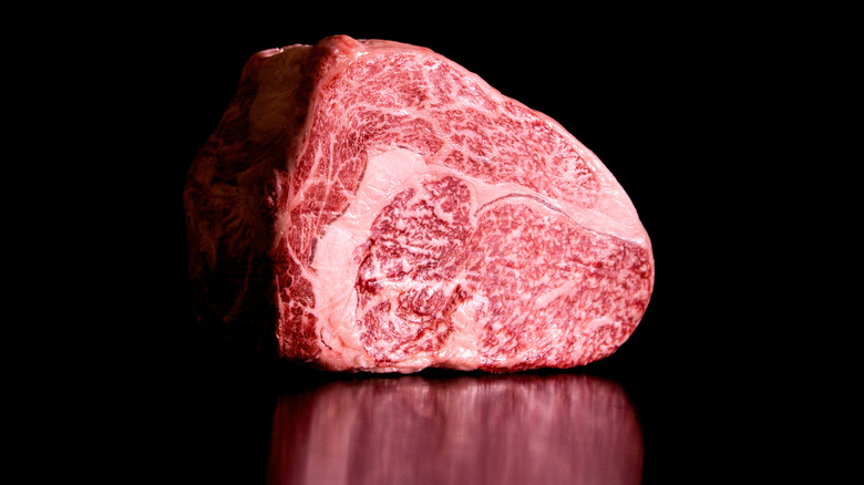 Wagyu beef isolated on a black background