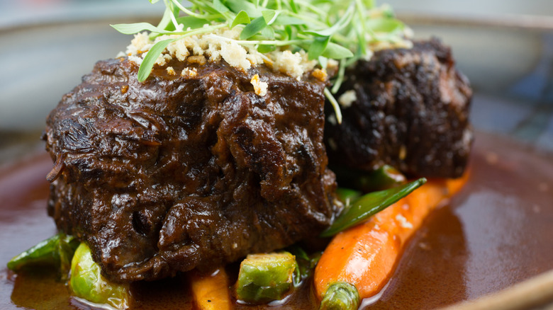 Braised beef short rib platter with veggies