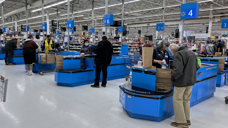 People checking out at Walmart