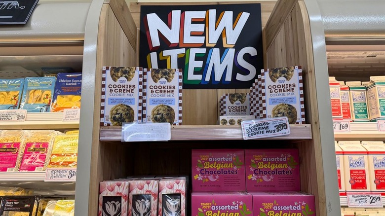Display of new items at Trader Joe's including cookie mix and assorted belgian chocolates
